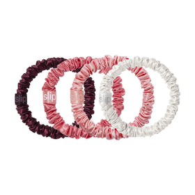 Close-up of candy cane ornament packaging for SLIP Skinny Scrunchies