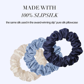 SLIP Skye indigo silk scrunchie adds soft shine and care.