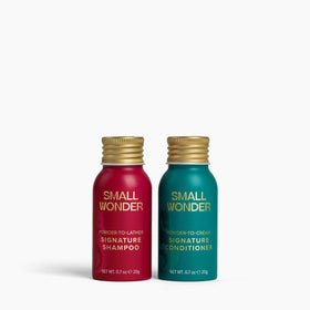 Small Wonder Signature Shampoo powder-to-cream activation delivers a rich cleansing lather.