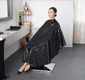 SMARTHAIR cape with a storage loop for easy hanging between appointments.