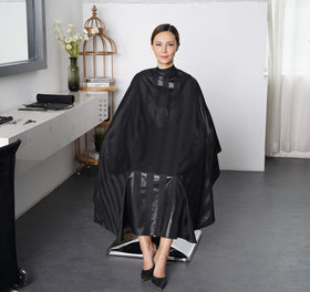 SMARTHAIR cape showing water-repellent and anti-static properties to reduce cling.