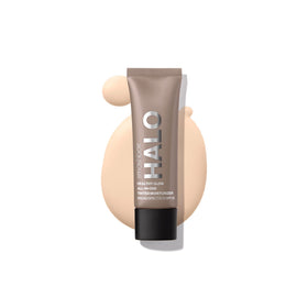 Smashbox Halo Healthy Glow tinted moisturizer bottle with SPF 25 for dewy coverage.