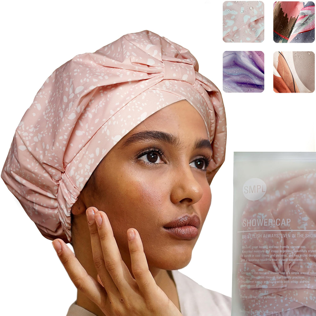 SMPL Objects shower cap with leakproof forehead strip keeps hairstyles secure during showers.