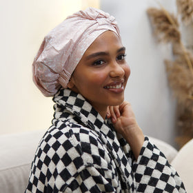 SMPL Objects cap features a nonslip interior to prevent sliding while washing hair.