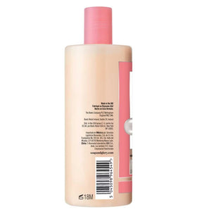 Soap & Glory Clean On Me gel bottle on shower shelf conveys spa-like freshness