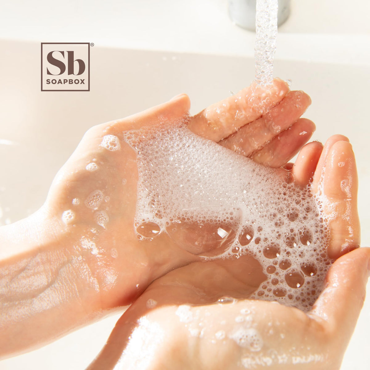 Soapbox natural ingredients image emphasizes shea butter and coconut oil for nourished skin.