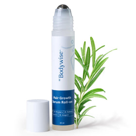 SOFTIZ Be Bodywise Rosemary Hair Growth Serum roller applying to the scalp for targeted thinning areas