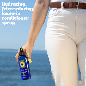 Solar Recover lightweight mist absorbs quickly without weighing hair down