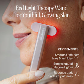 Solawave wand head rotated to follow facial contours for precise treatment.