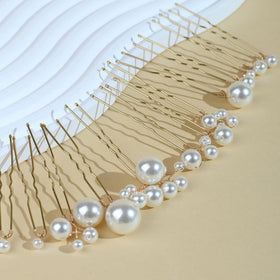 SOLENY bridal hairstyle ideas featuring pearl pins