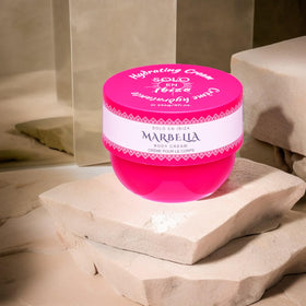 Applying Solo en Ibiza Bella Marbella Hydrating Cream to dry skin in morning routine.