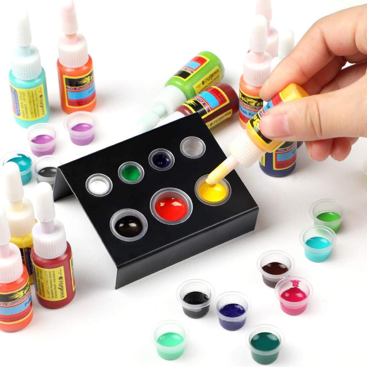 Solong Tattoo ink set 54 colors in-use session capturing vibrant hues during design