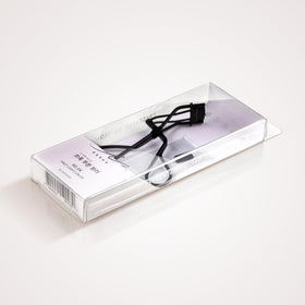 Soo Ador Okhee Lash Half Curler helps groom short lashes without crimping