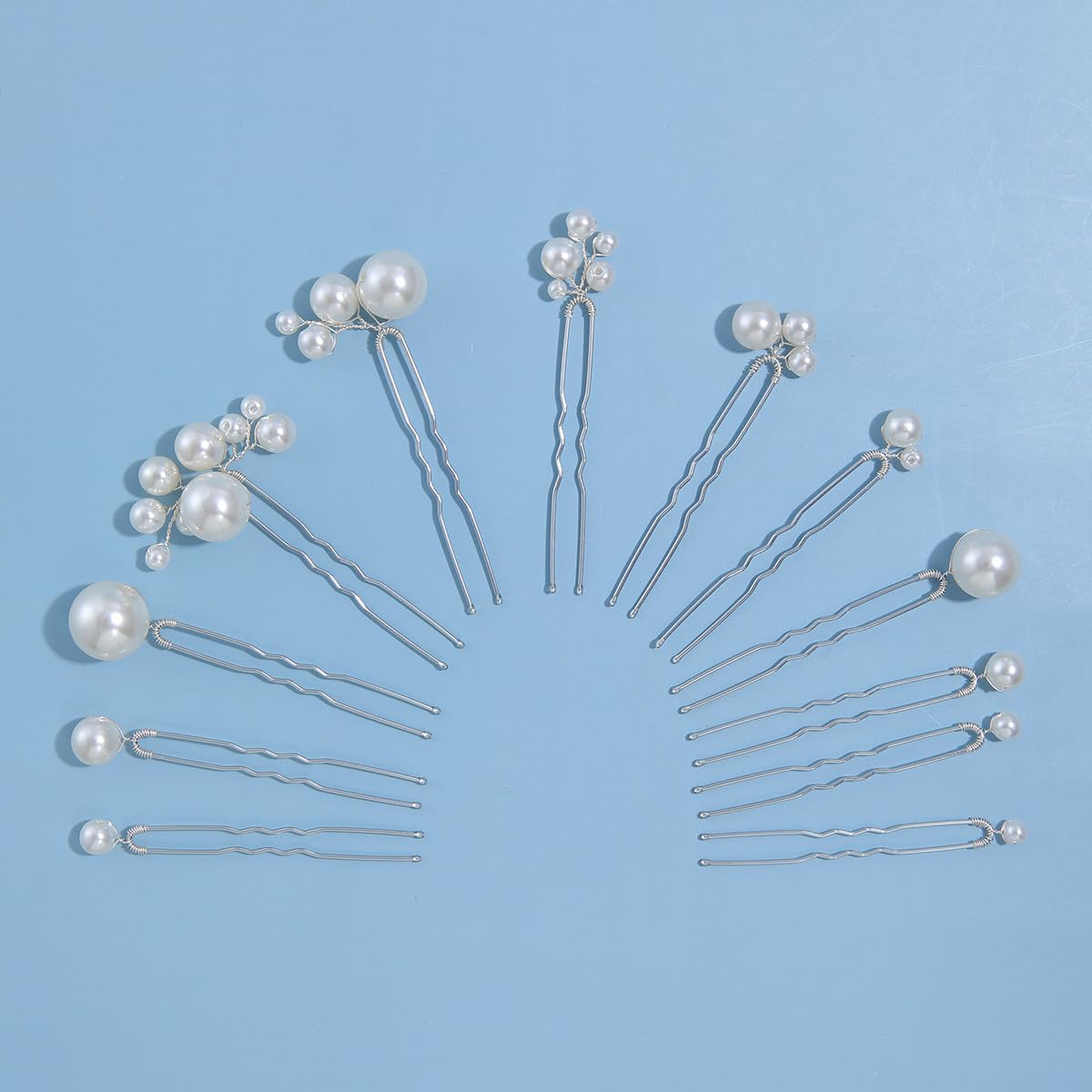 Soulshow pearl hair pin bundle display, illustrating multiple pins for customized bridal updos.