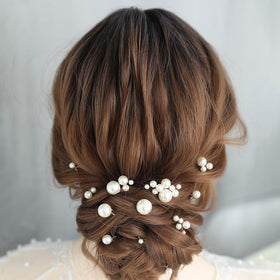 Soulshow pearl bridal hair pin worn in hair, showcasing versatile styling for brides and guests.