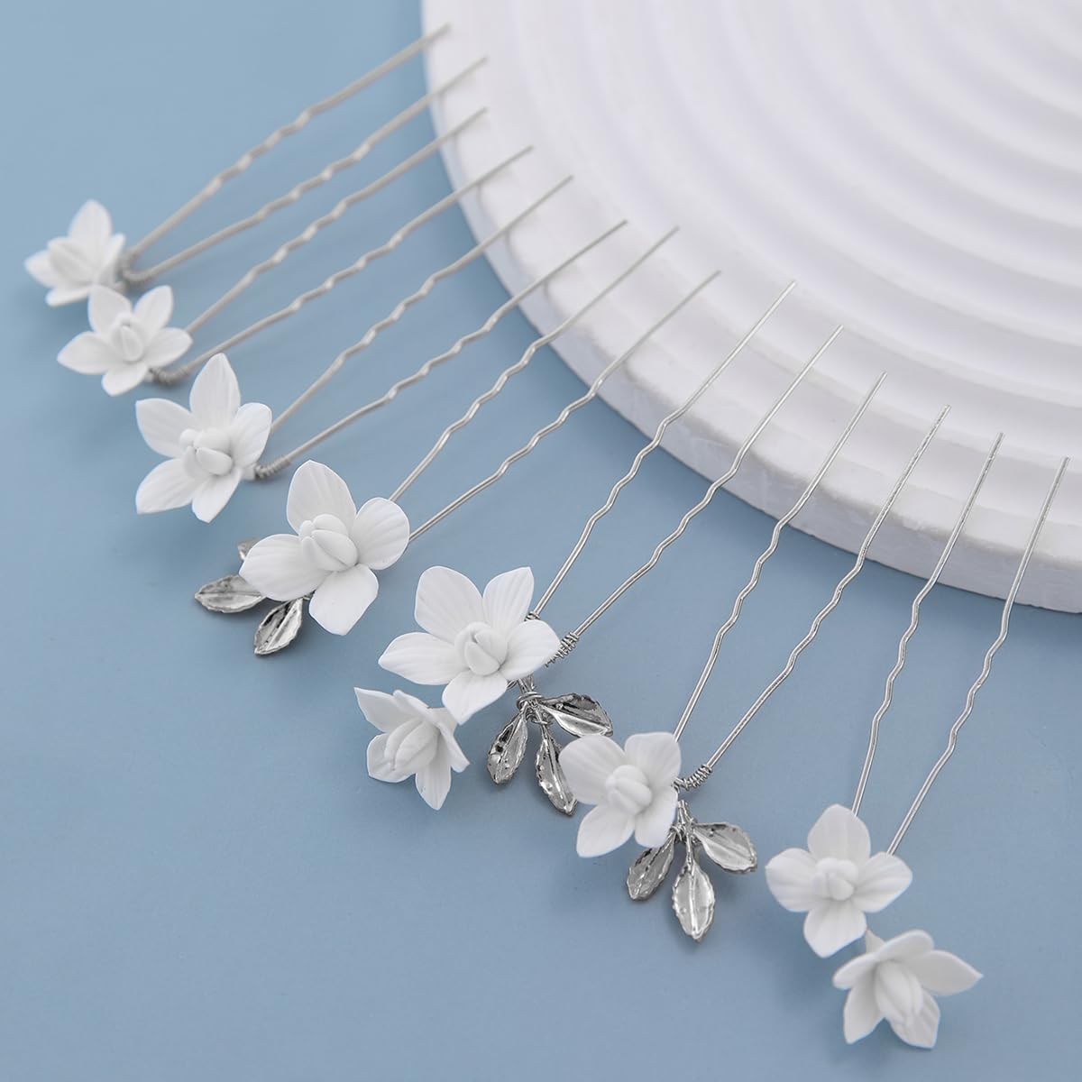 Soulshow bridal hair pin with white flower, perfect for elegant wedding updos.