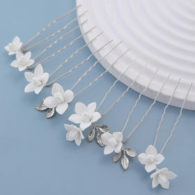 Soulshow bridal hair pin with white flower, perfect for elegant wedding updos.