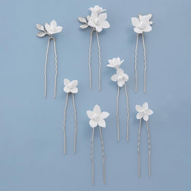 Soulshow wedding hair clip with white flower, adds vintage charm to bridesmaids hairstyles.