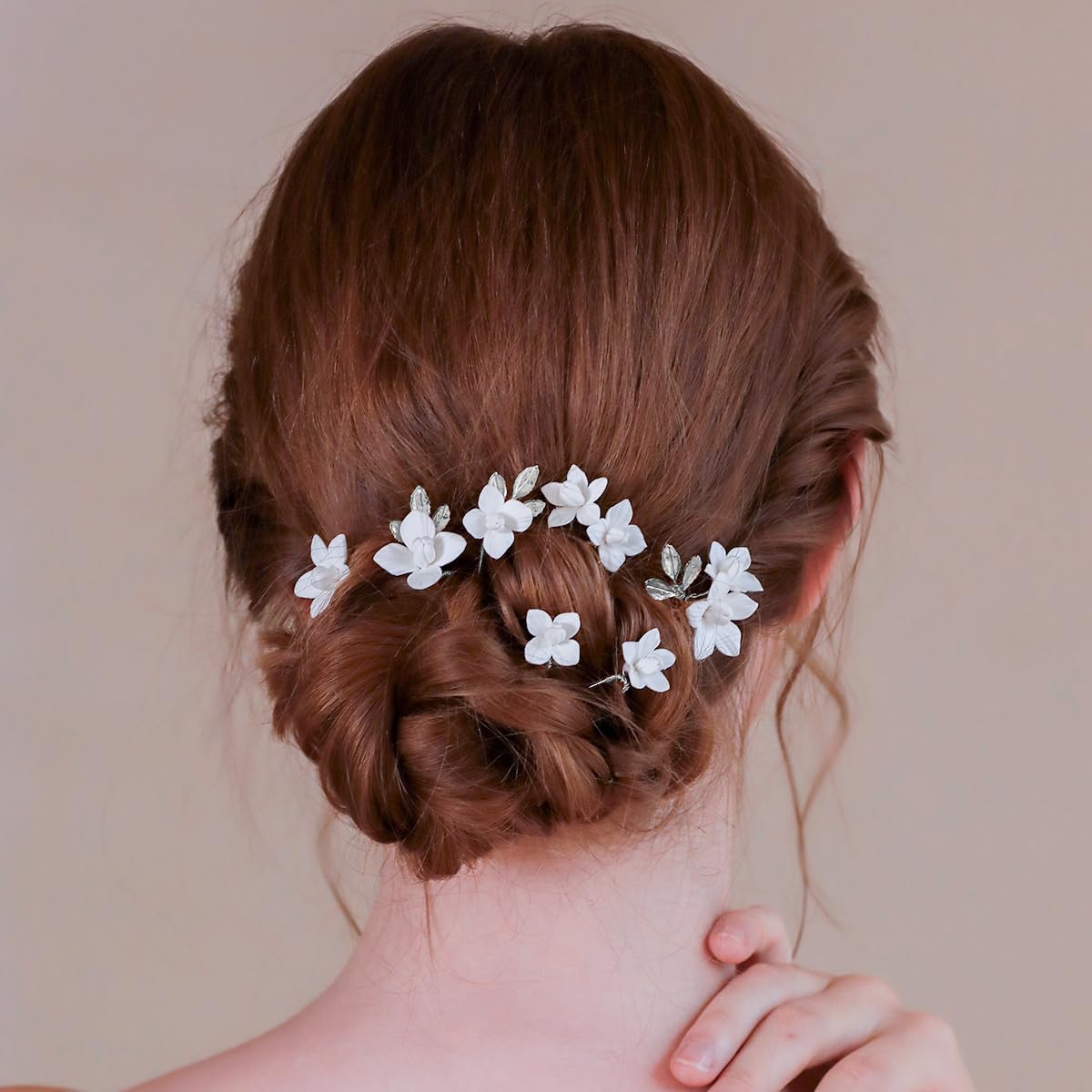 Soulshow flower pin for wedding day, versatile for different hairstyles.