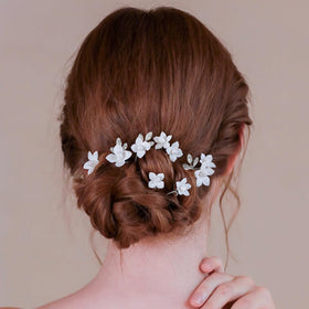 Soulshow flower pin for wedding day, versatile for different hairstyles.