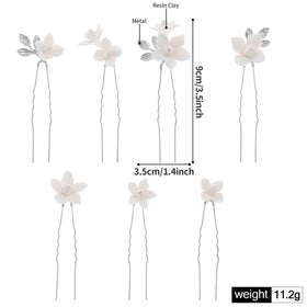 Soulshow delicate flower pin detail, showcasing artisan craftsmanship for special occasions.
