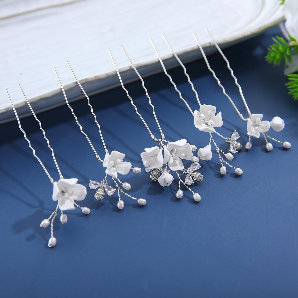 Soulshow silver bridal hair clip detail adds elegant sparkle for bridesmaids' hairstyles.