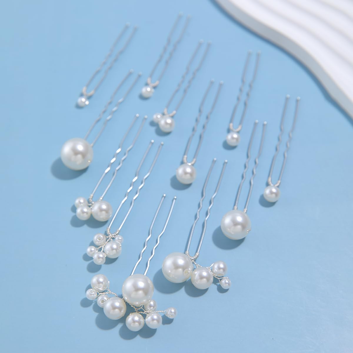 Soulshow silver finish bridal hair pin, subtle shine for timeless wedding elegance.