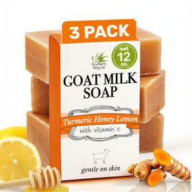 Southern Natural turmeric honey lemon goat milk soap bar closeup highlighting natural ingredients for gentle hydration.