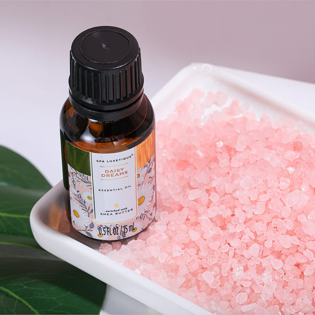 Spa Luxetique daisy scent opening in a bath setting.