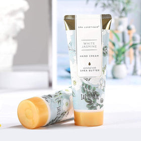 Spa Luxetique gift box display with durable cloth packaging for gifting.