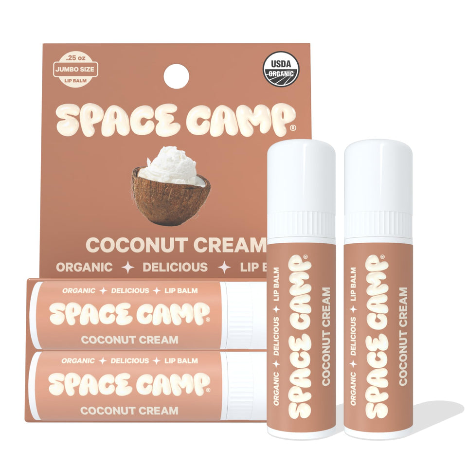 Space Camp Wellness jumbo lip balm coconut-cream on lips for lasting hydration.