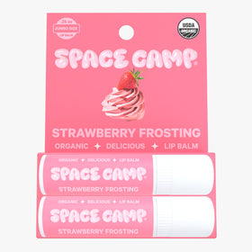 Close-up of Space Camp lip balm tube showing creamy, nourishing texture.