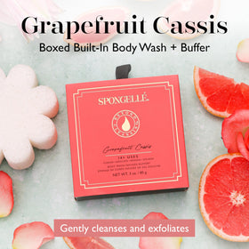 SPONGELLÉ sponge label close-up highlights built-in wash for convenient showers.