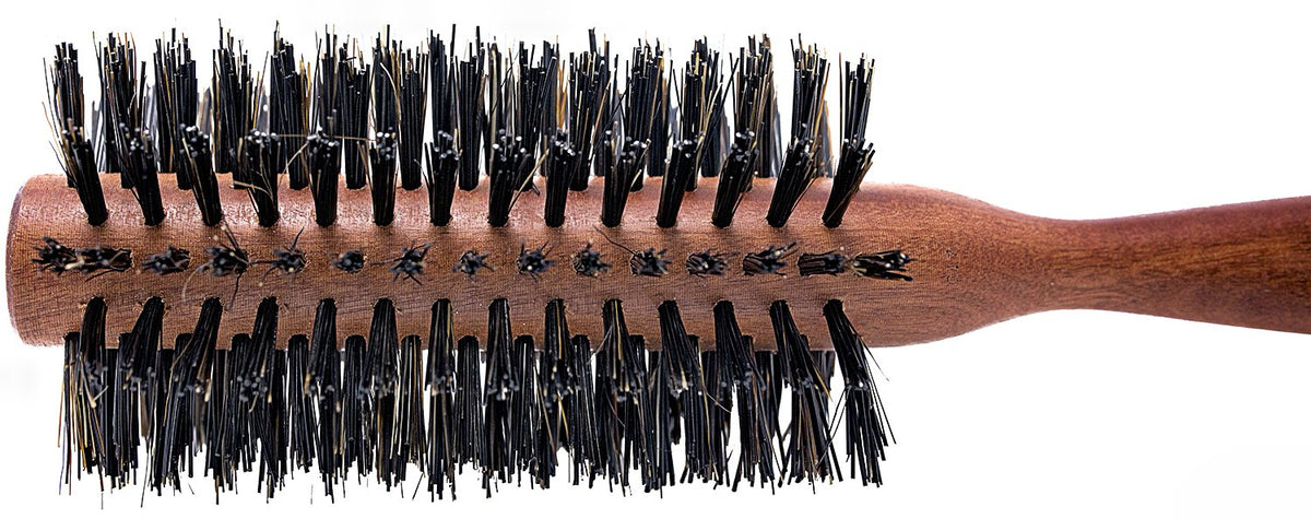 SPORNETTE brush lifts roots and adds volume for fuller styles