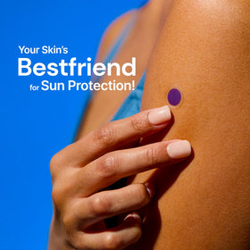 SpotMyUV sticker on skin shows real-time protection cues.