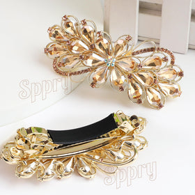 Sparkling rhinestones catch light for evening or everyday wear.