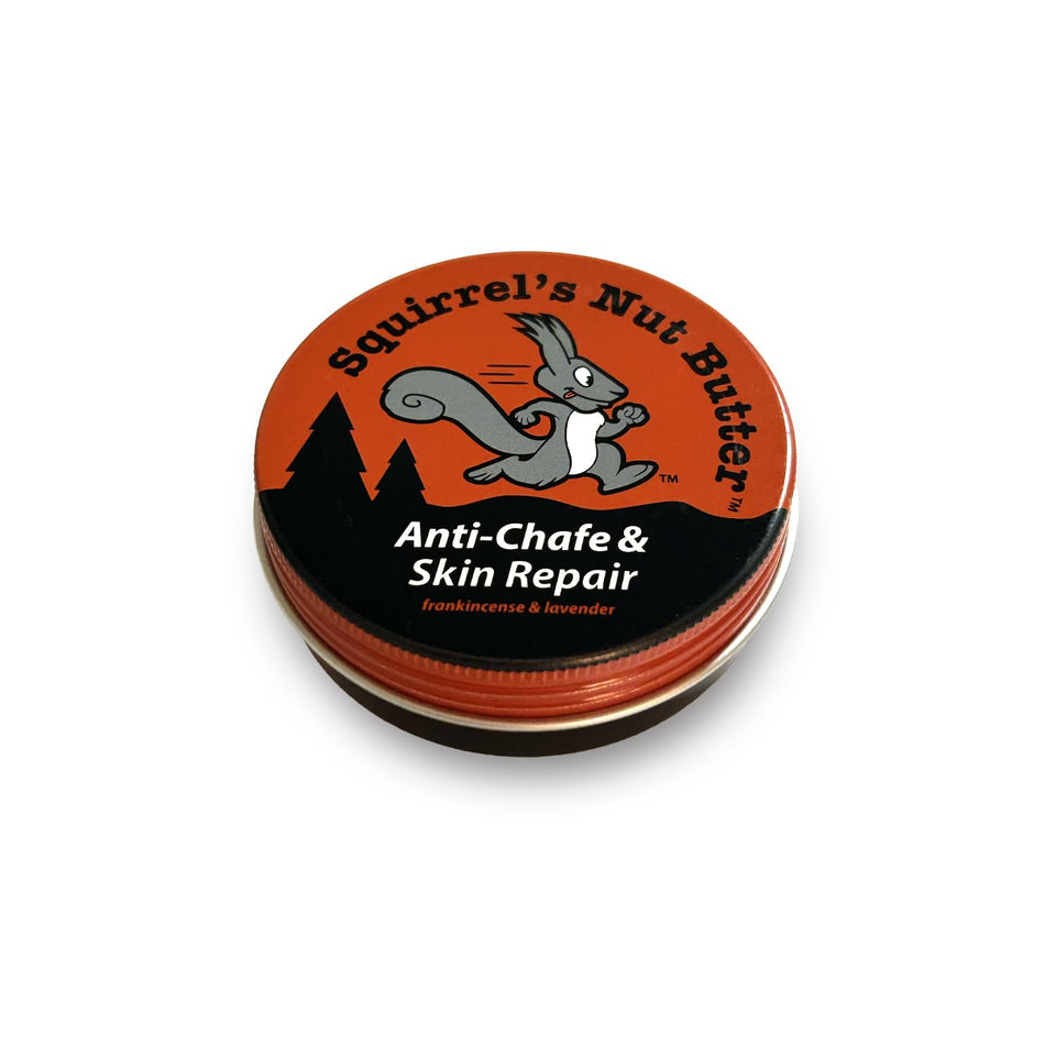 Squirrel's Nut Butter anti chafe balm tin with frankincense and lavender, protective for workouts.