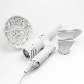 SRILabs DryQ hair dryer in white, folded-friendly for travel and compact storage.