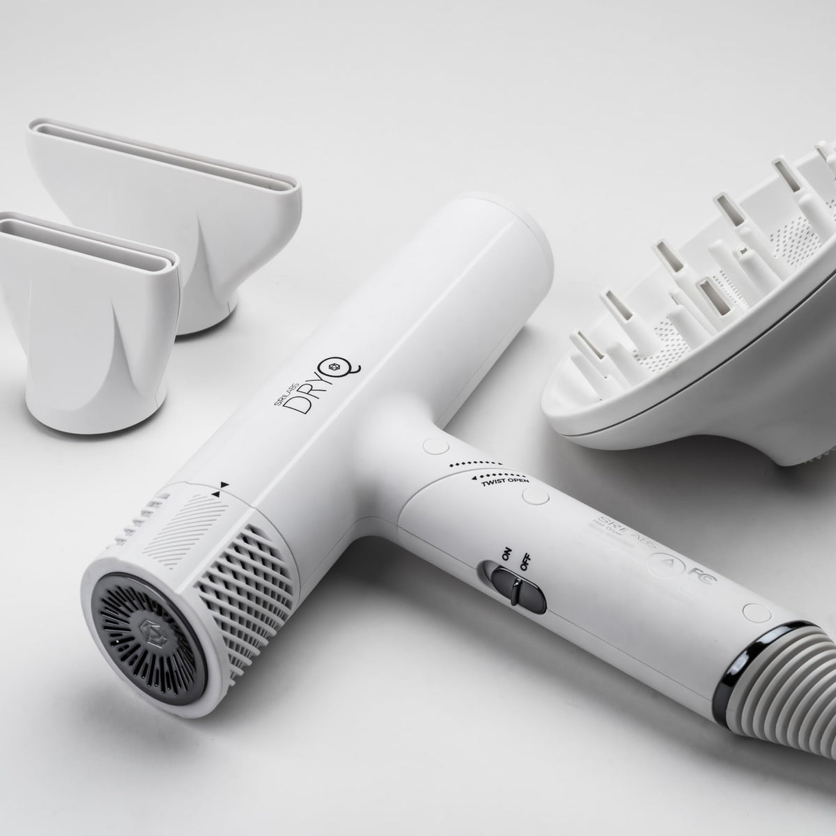 SRILabs DryQ white in-use with diffuser for smooth styling and frizz control.