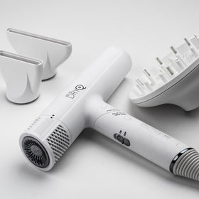 SRILabs DryQ white in-use with diffuser for smooth styling and frizz control.