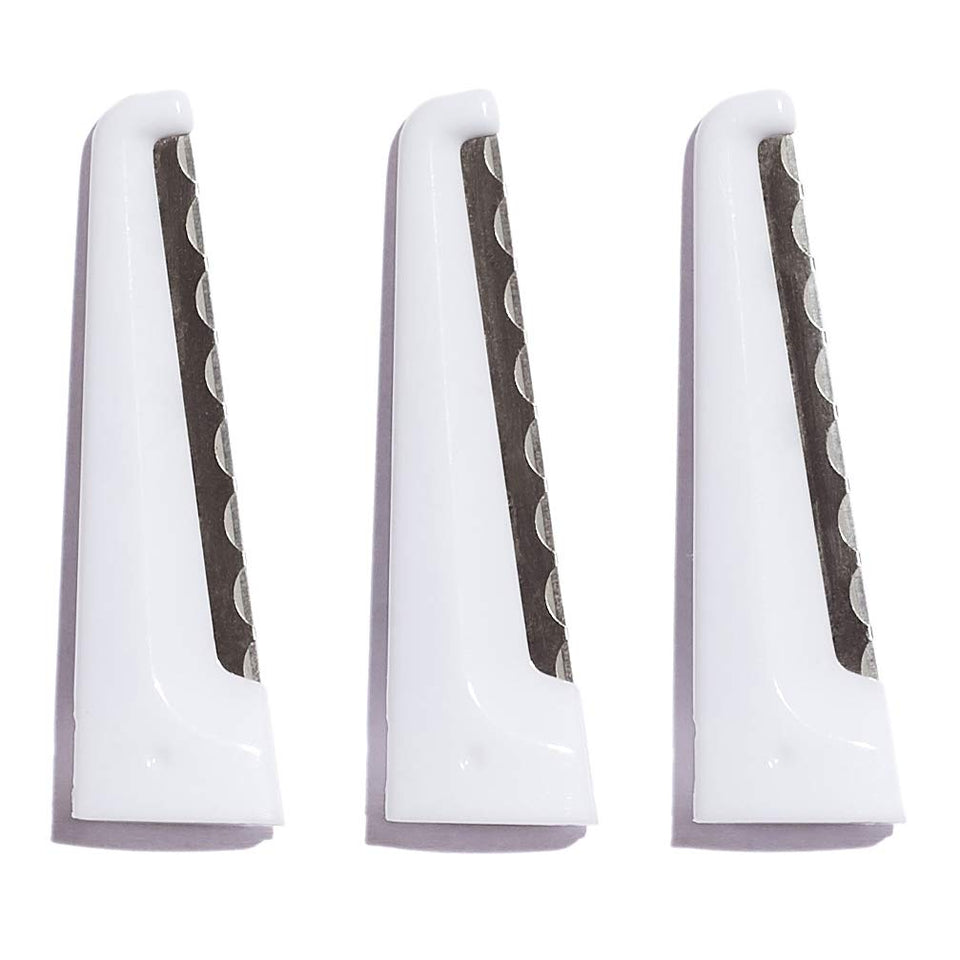 StackedSkincare dermaplaning blades 3-pack with protective caps for safe storage between uses.