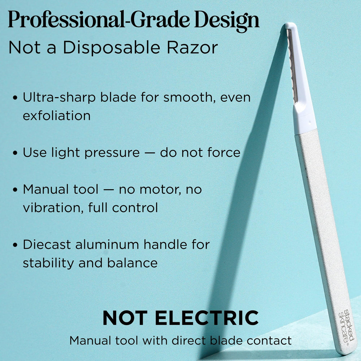 StackedSkincare dermaplaning tool side grip showing ergonomic control