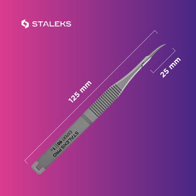 STALEKS PRO Expert 90 cuticle micro scissors in professional manicure setup.