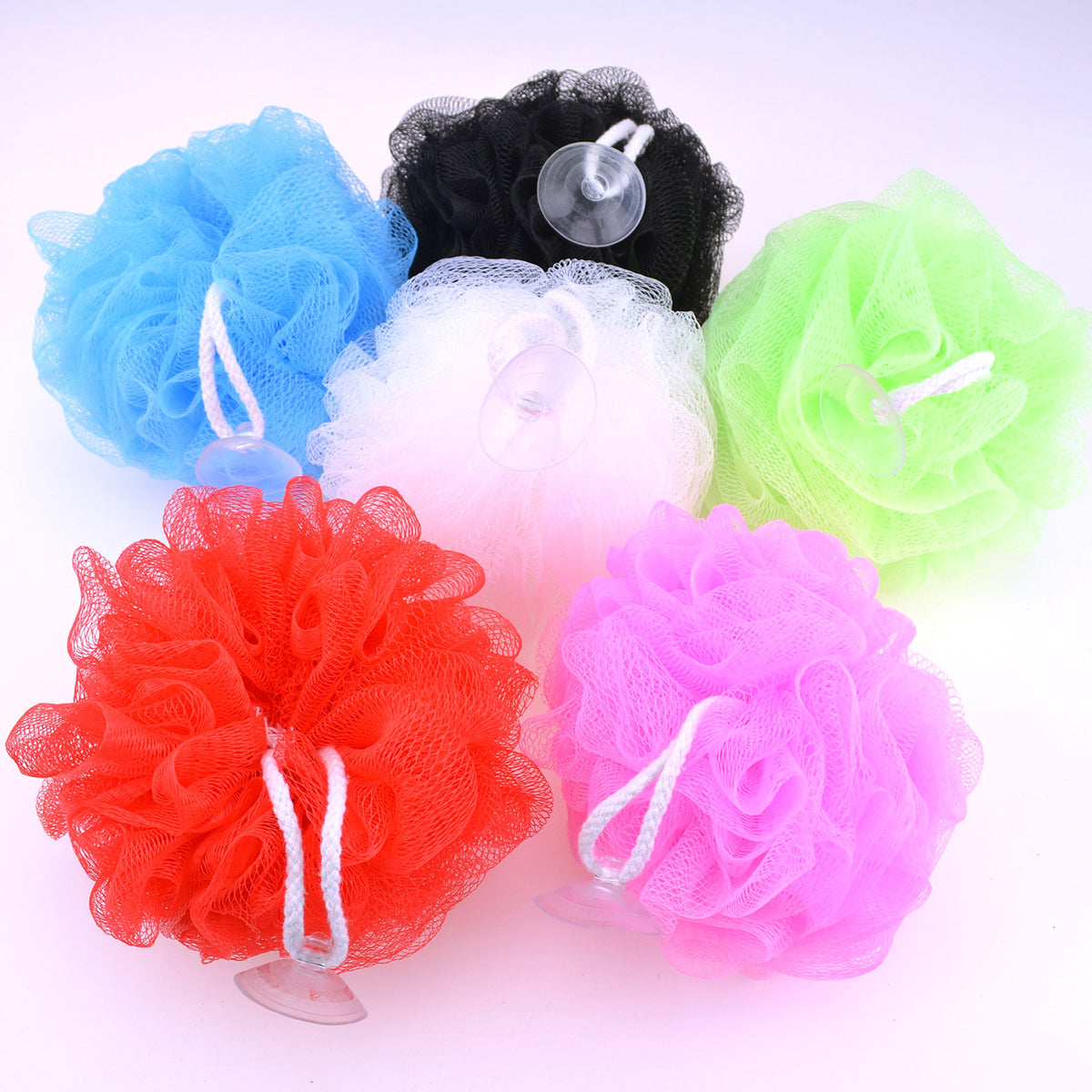 Star bath sponge with upgraded suction cup keeps it securely hung and dries faster.