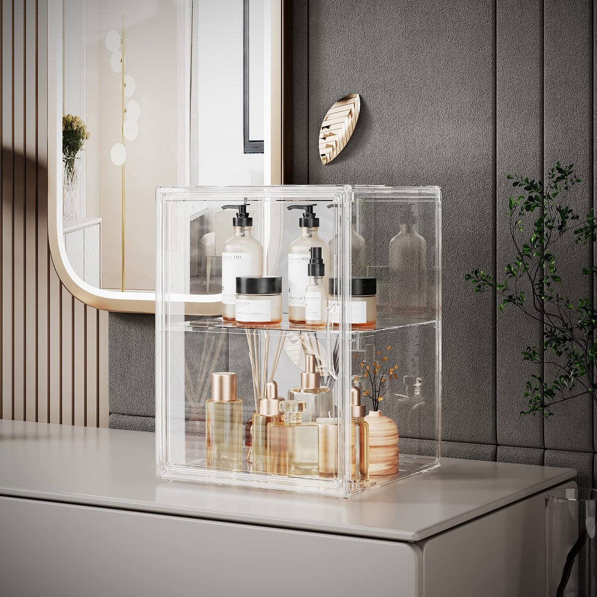 Starogegc acrylic cosmetics bin with division board separates perfumes, lipsticks, and polishes.