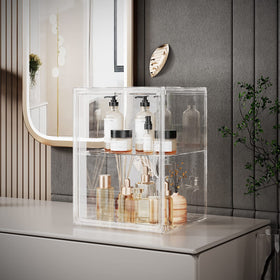 Starogegc acrylic cosmetics bin with division board separates perfumes, lipsticks, and polishes.