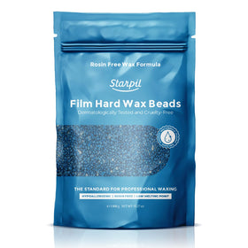 Starpil Blue hard wax beads packaging showing rosins-free formula for gentle waxing sessions