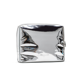 Stay Golden insulated makeup bag in metallic silver with a secure zipper for spills.
