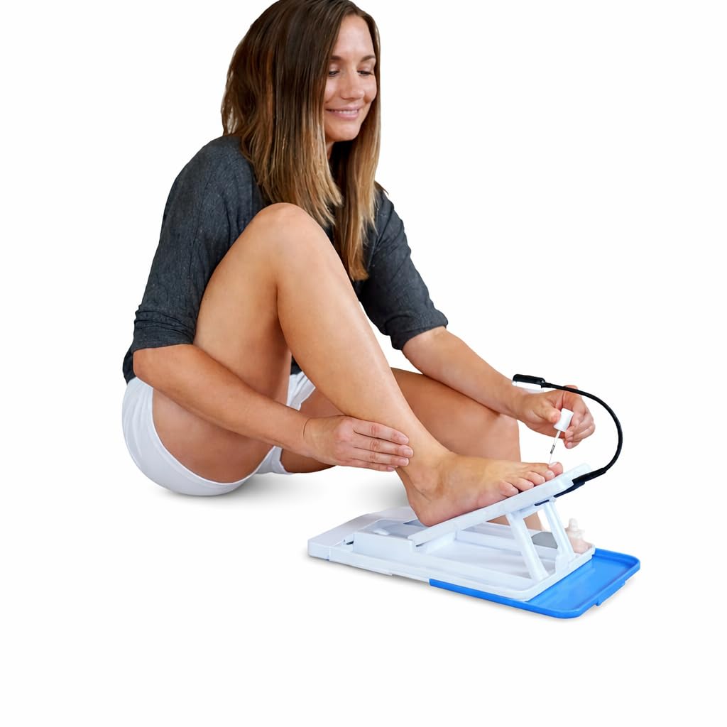 Stedi Pedi LED task light illuminates toes for precise grooming.