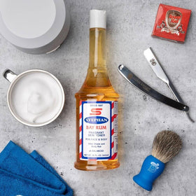 Application shot of Stephan's Bay Rum After Shave delivering an invigorating splash